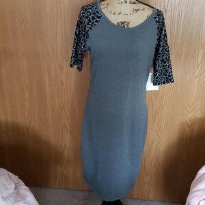 Large grey with black star sleeves lularoe Julia.